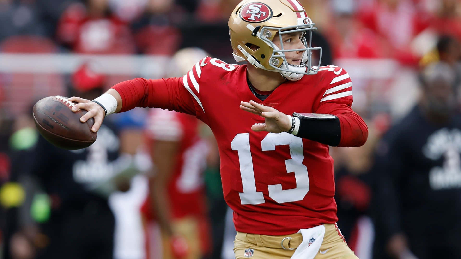 Brock Purdy49ers Quarterback Actiefoto Achtergrond