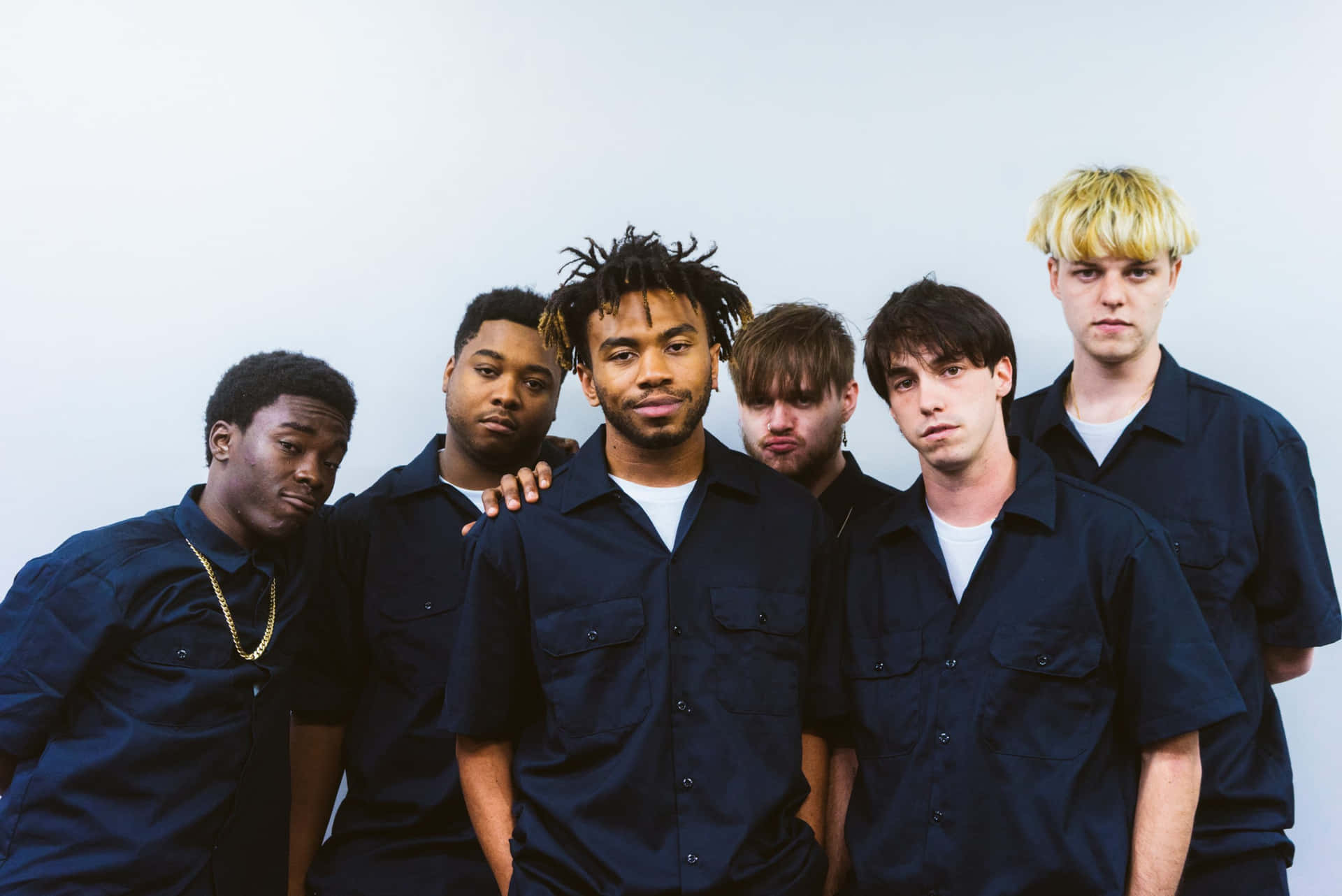Brockhampton band members posing together in a group photo Wallpaper