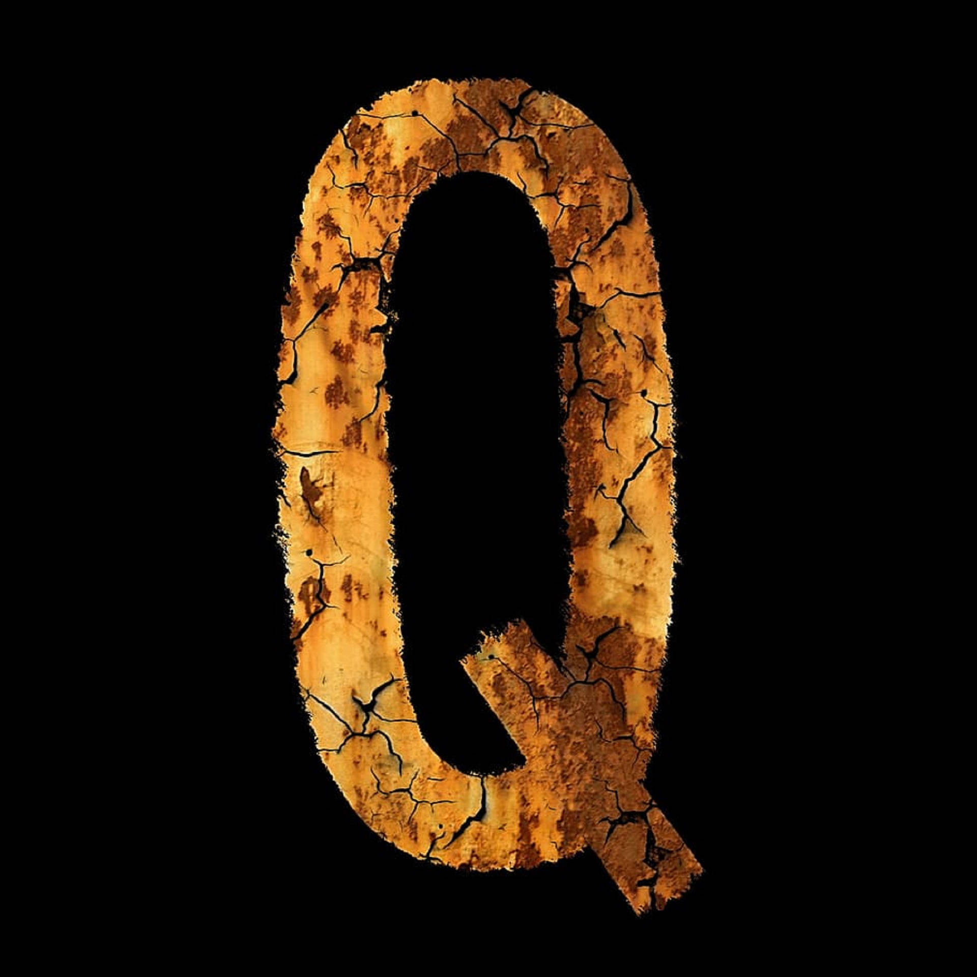 Broken Brown Letter Q Wallpaper