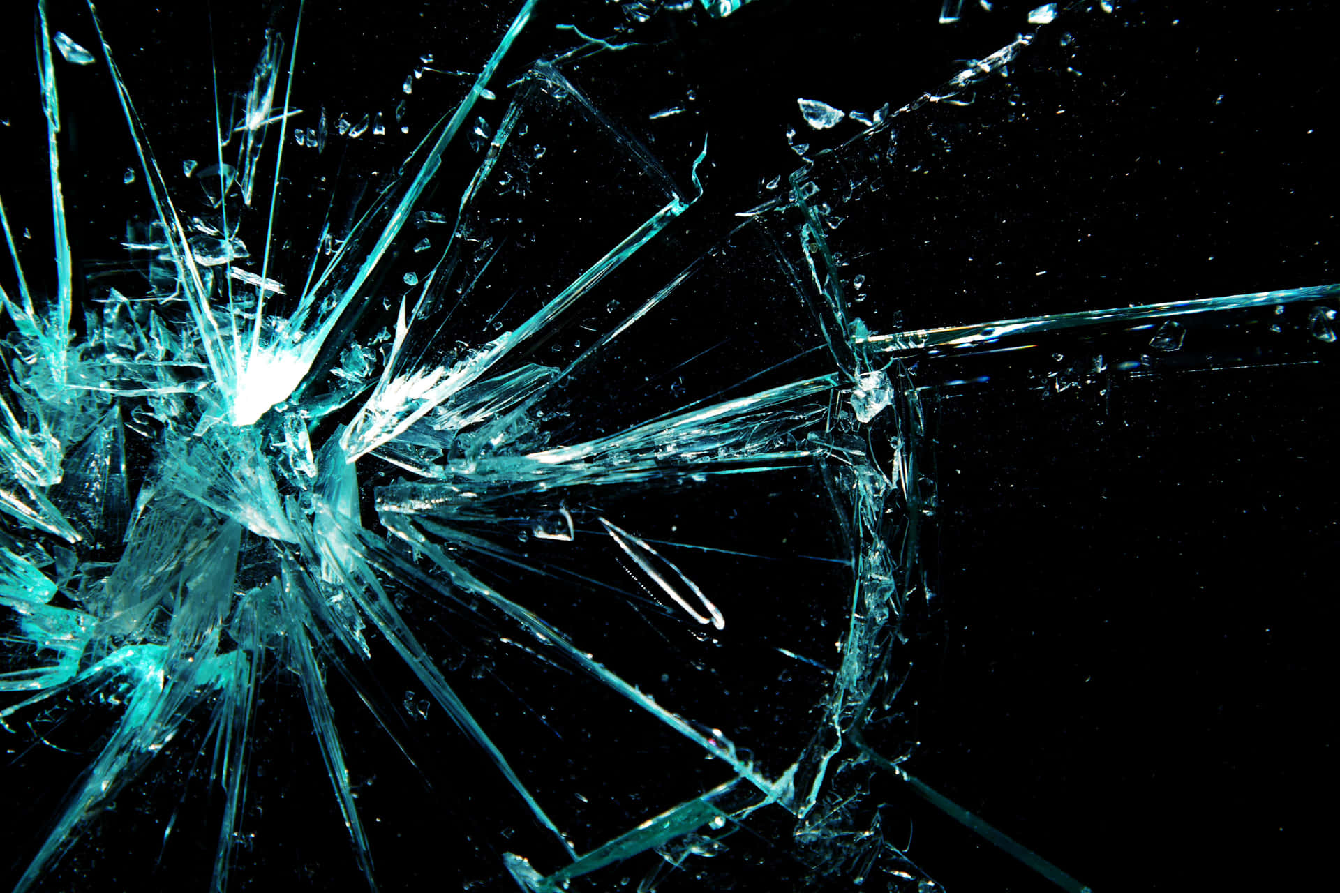 A shattered glass background highlighting the distinct beauty of destruction.