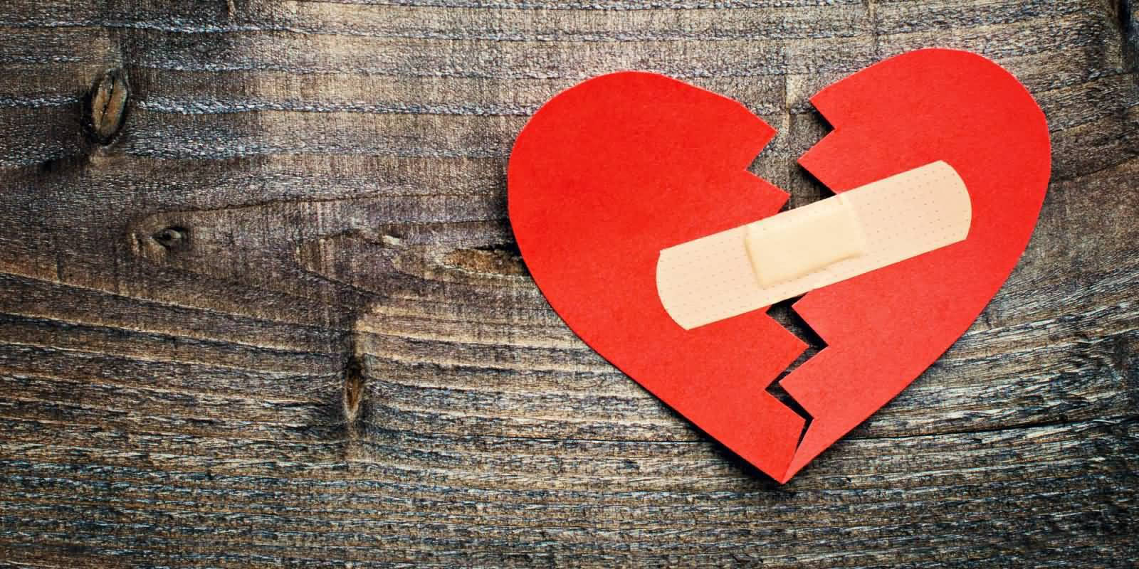 Broken Heart In Paper Background