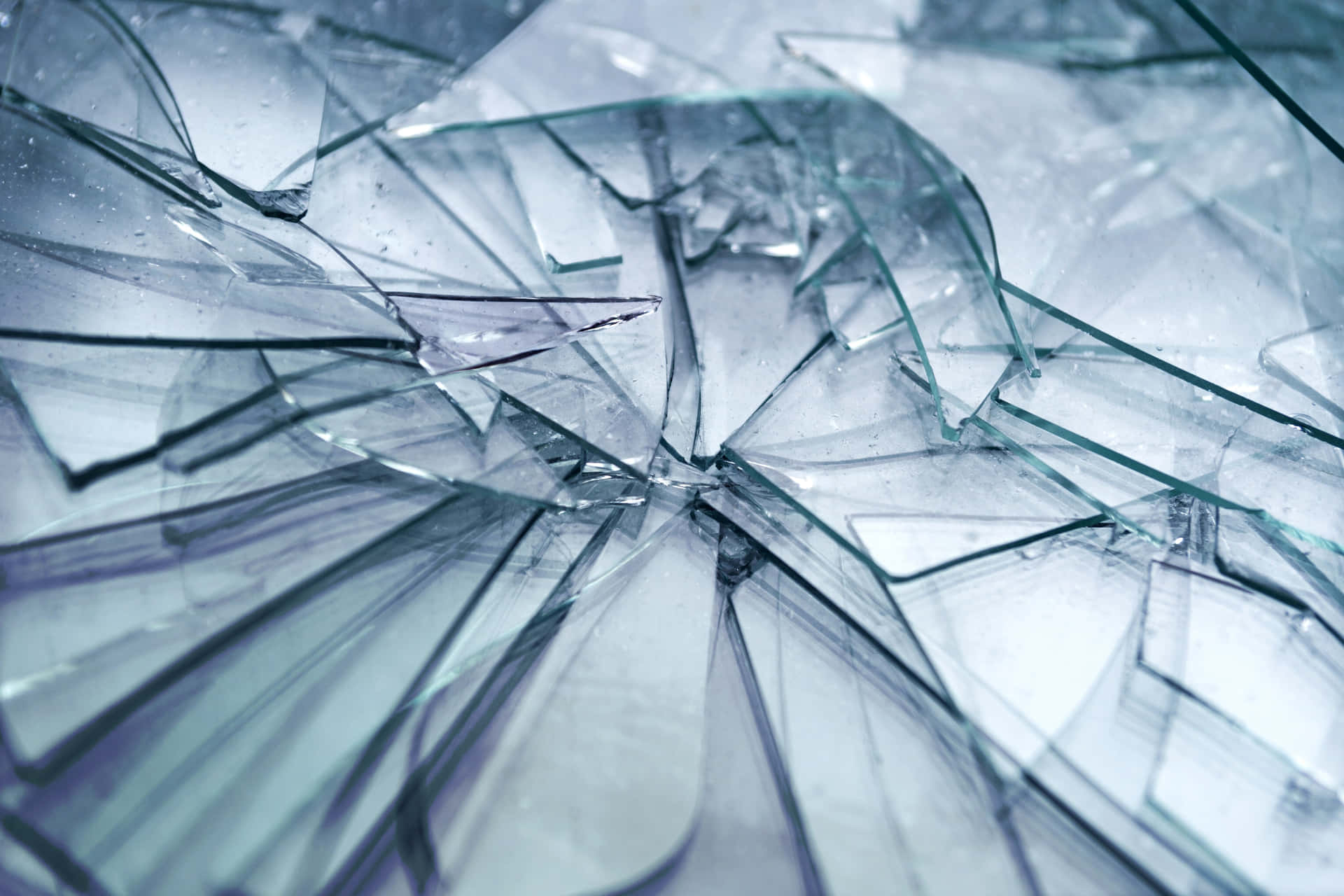 Broken Glass In A Glass Wall