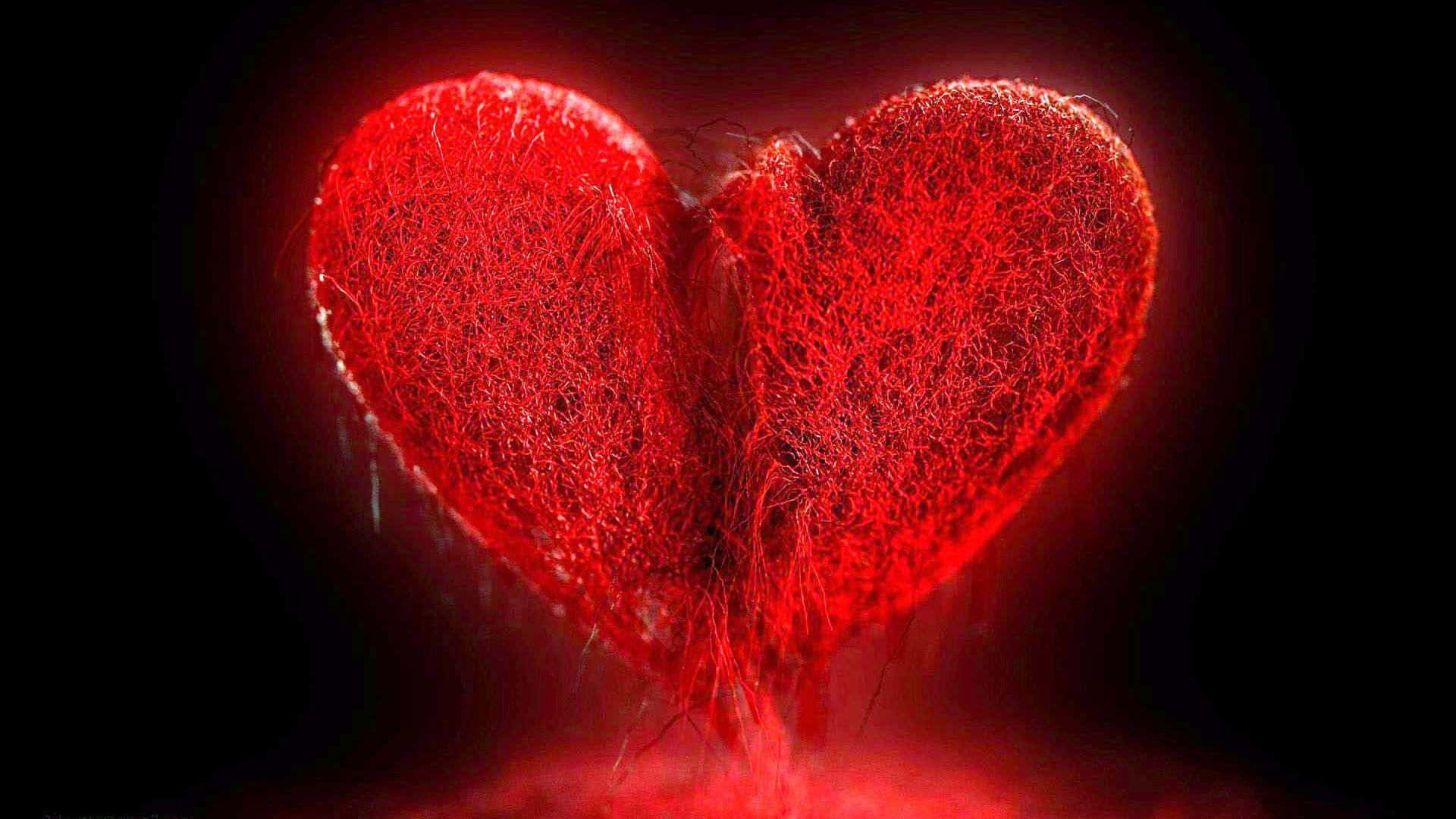 A Red Heart With A Black Background