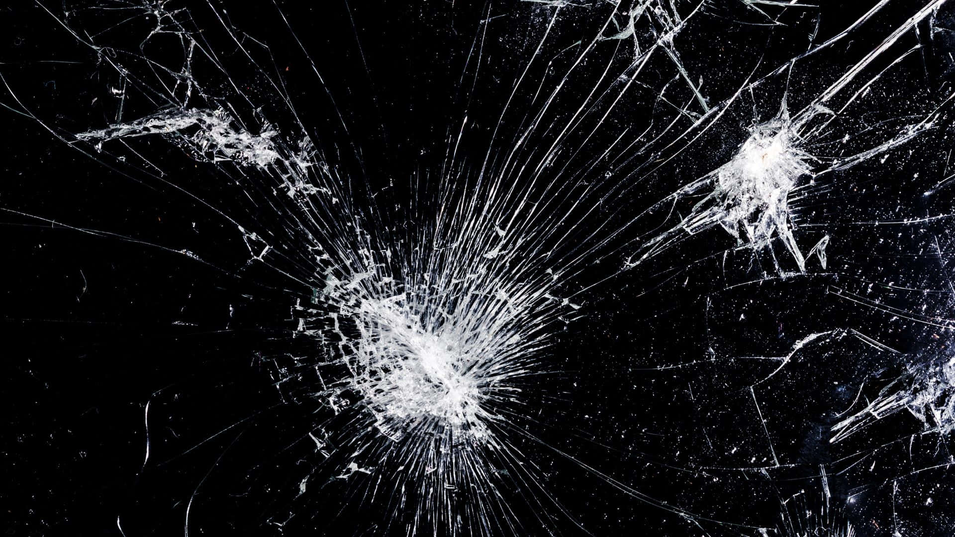 A Broken Glass With A Black Background