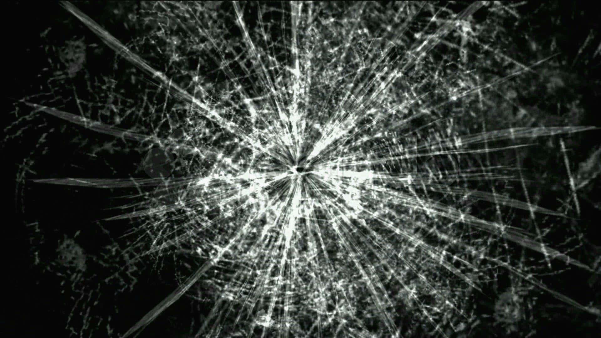 A Broken Glass With A Black Background Wallpaper