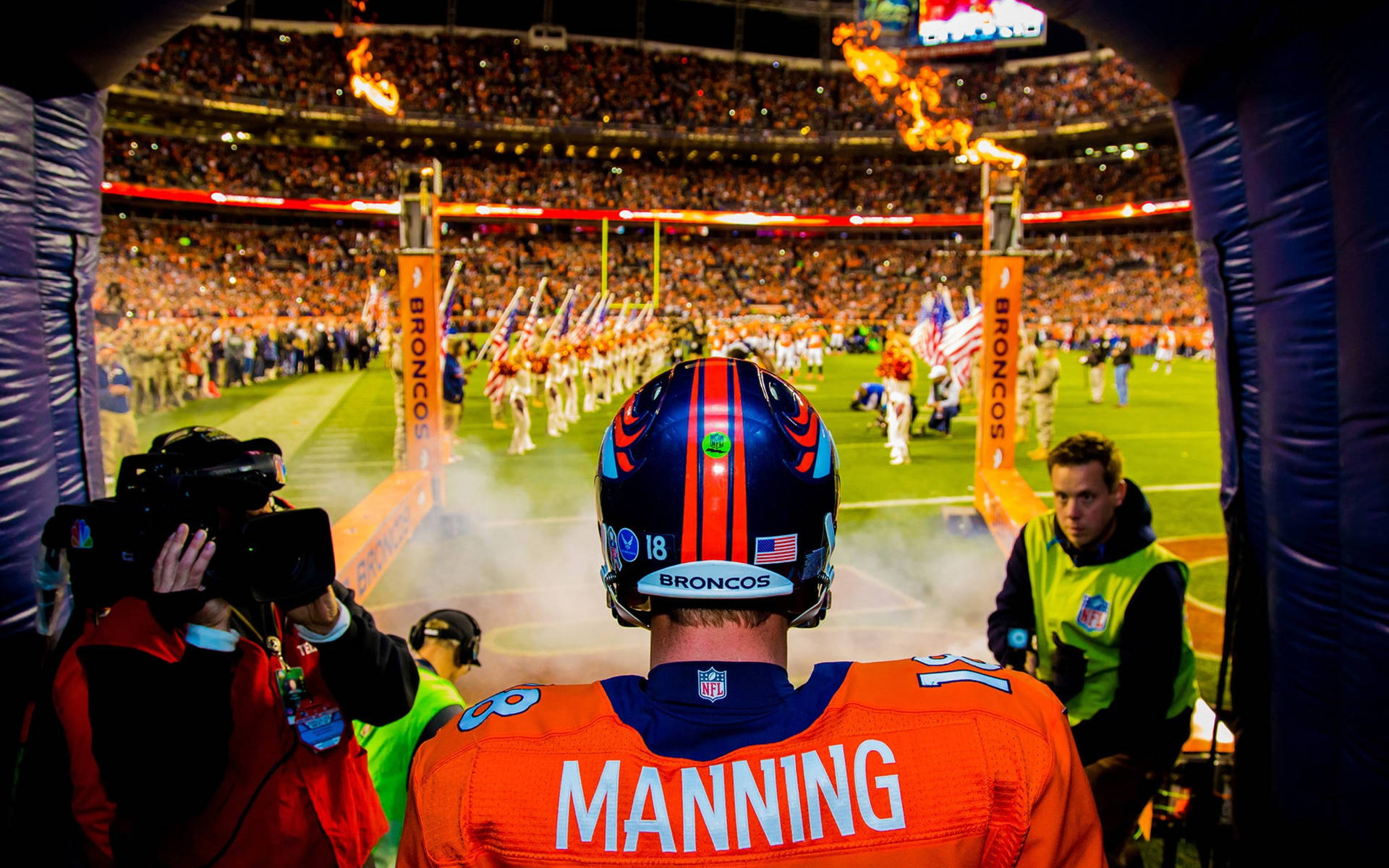 Broncos Manning Walking Into Stadium Wallpaper