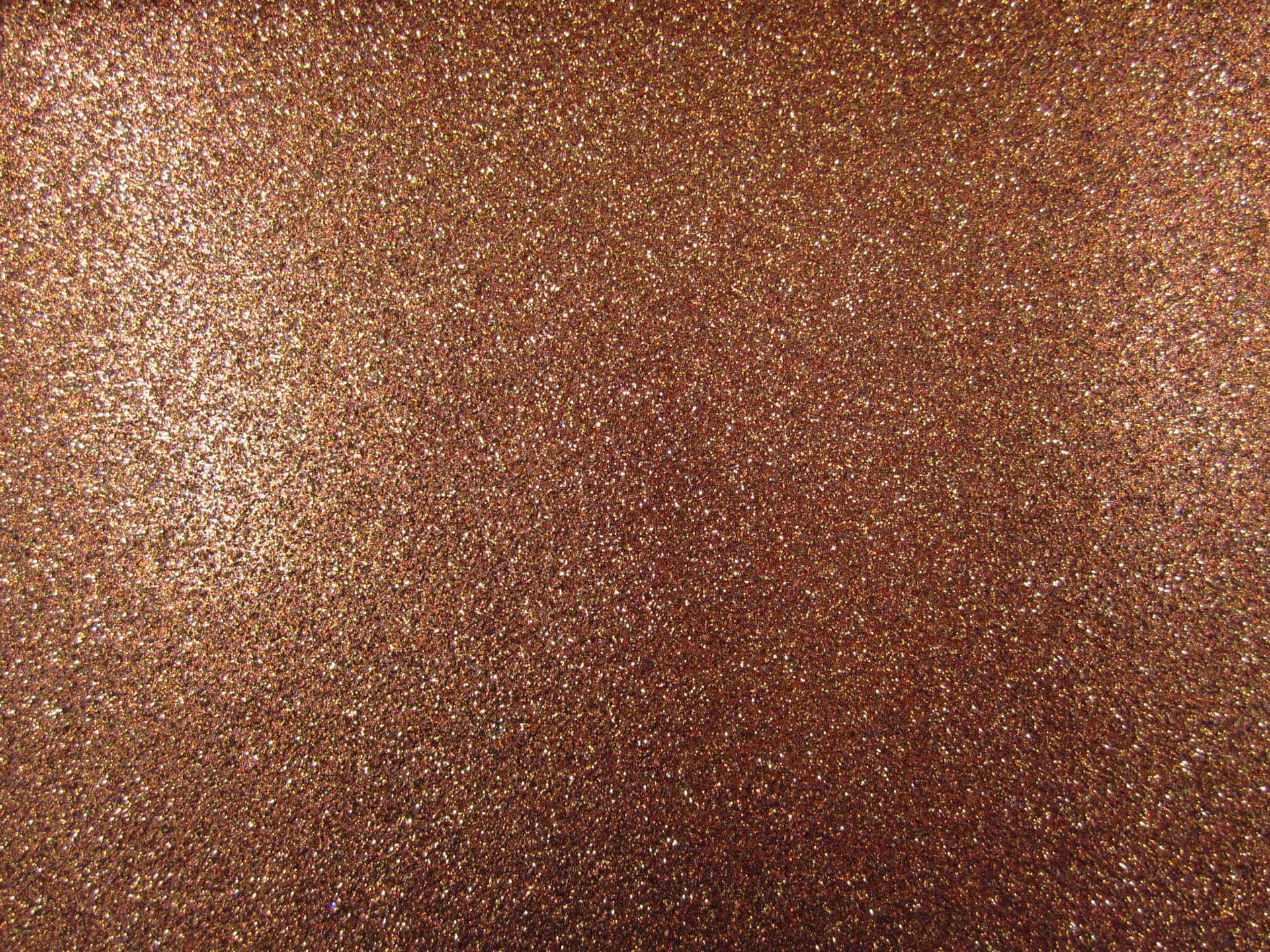 A Close Up Of A Brown Glitter Background