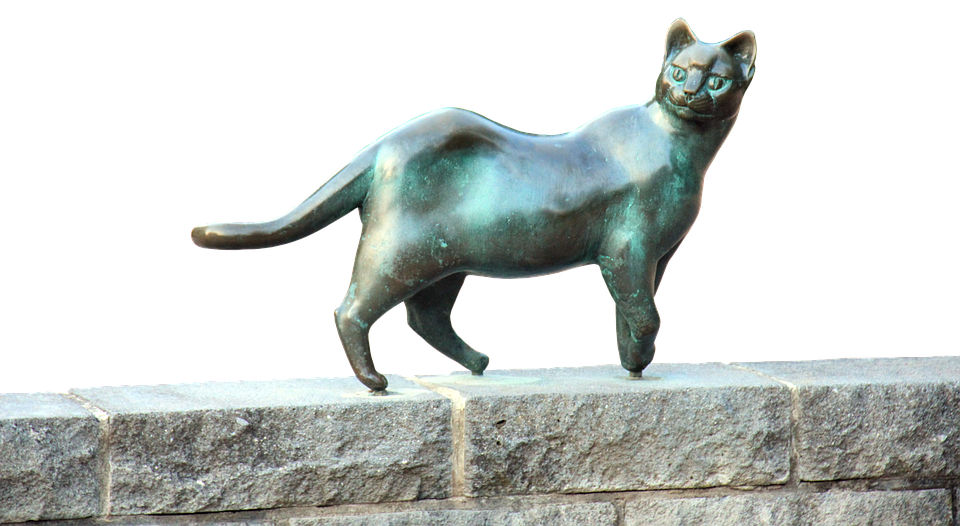 Bronze Cat Sculpture Stone Ledge PNG