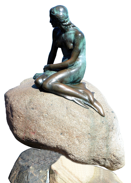 Bronze Mermaid Sculptureon Rock PNG