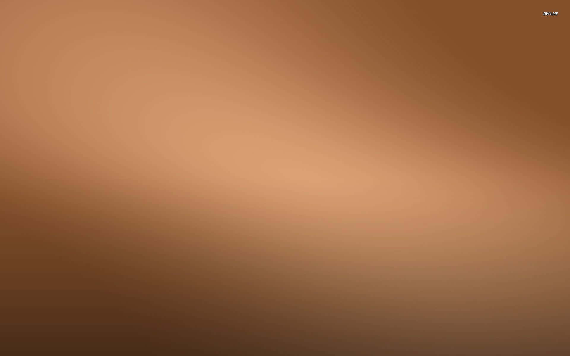 A Brown Background With A Light Brown Color Wallpaper