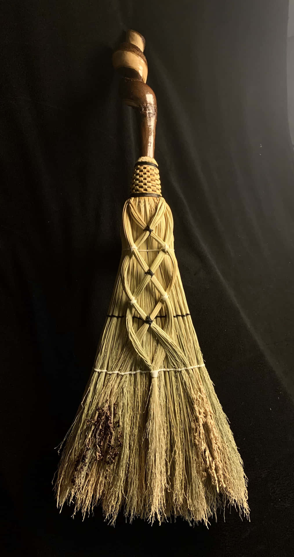 A Broom With A Wooden Handle And A Wooden Handle