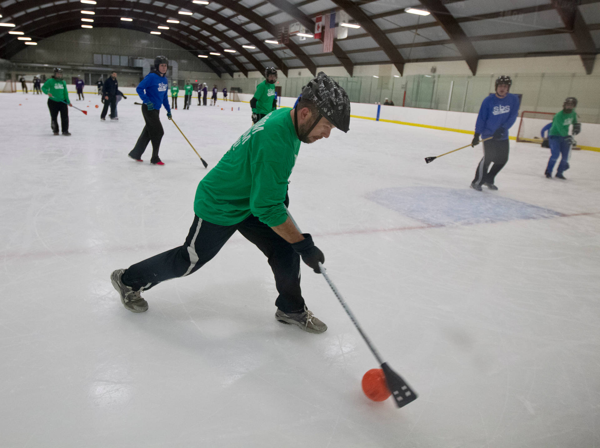 Broomball Green And Blue Sports Players Wallpaper