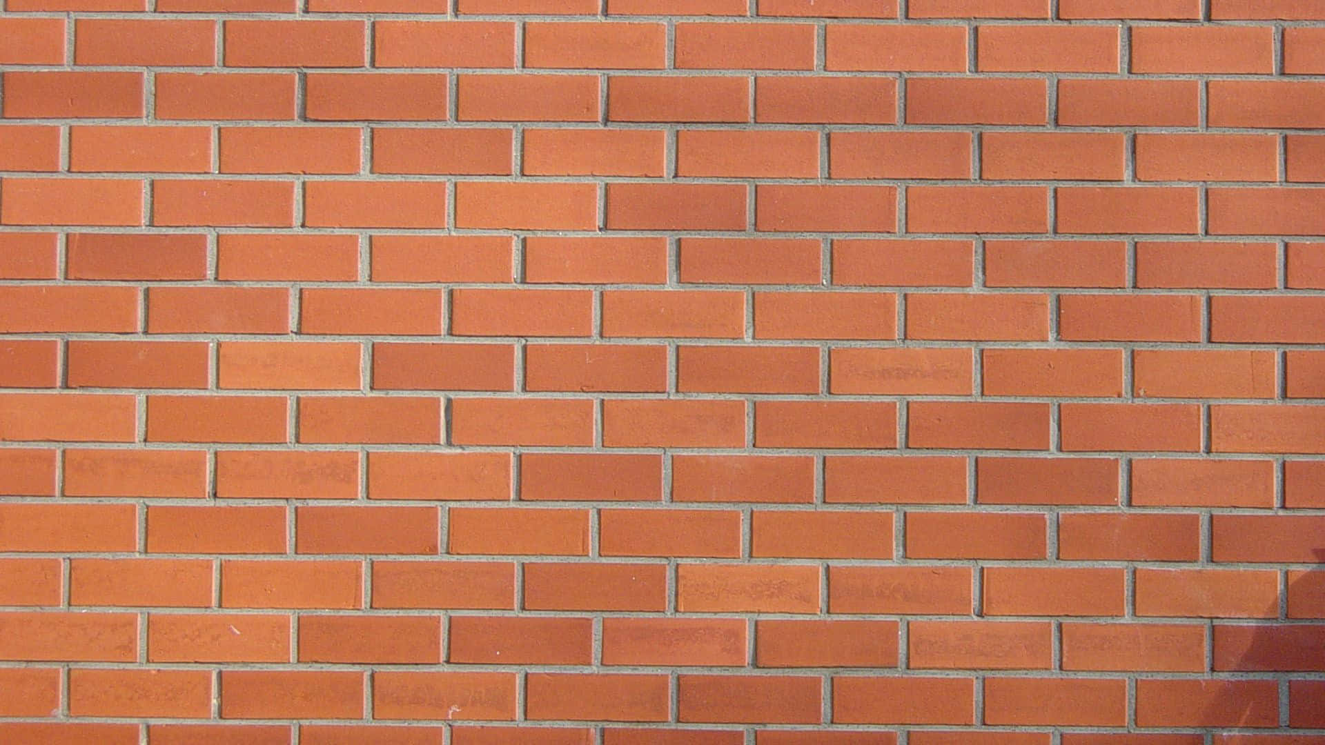 Rustic Brown Brick Wall Background Wallpaper