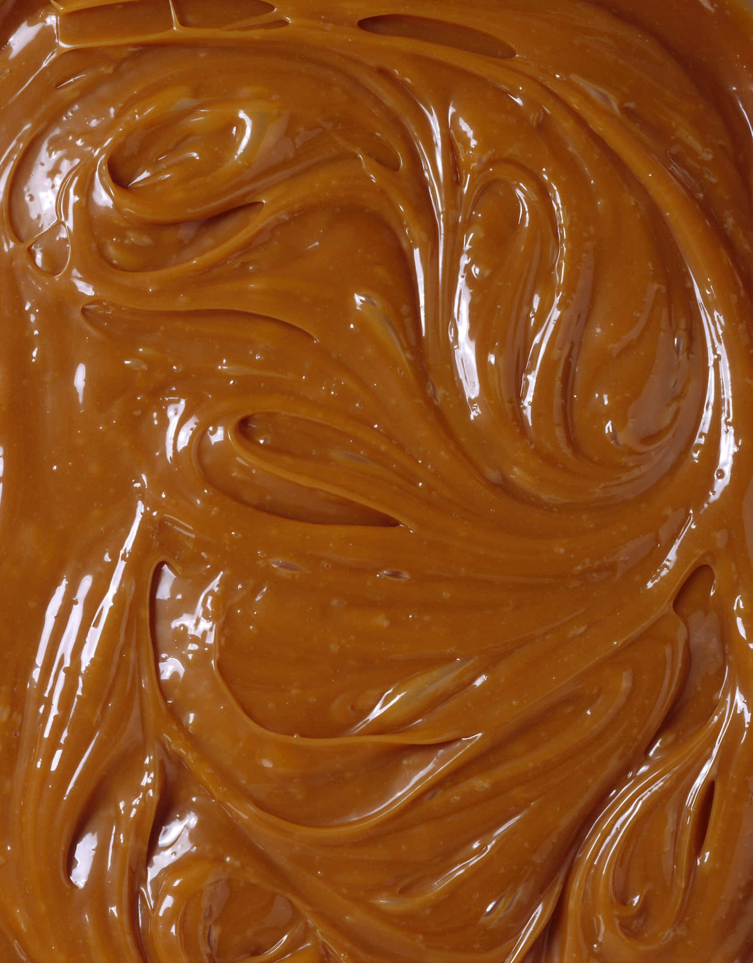 Decadent Brown Caramel Swirls Wallpaper