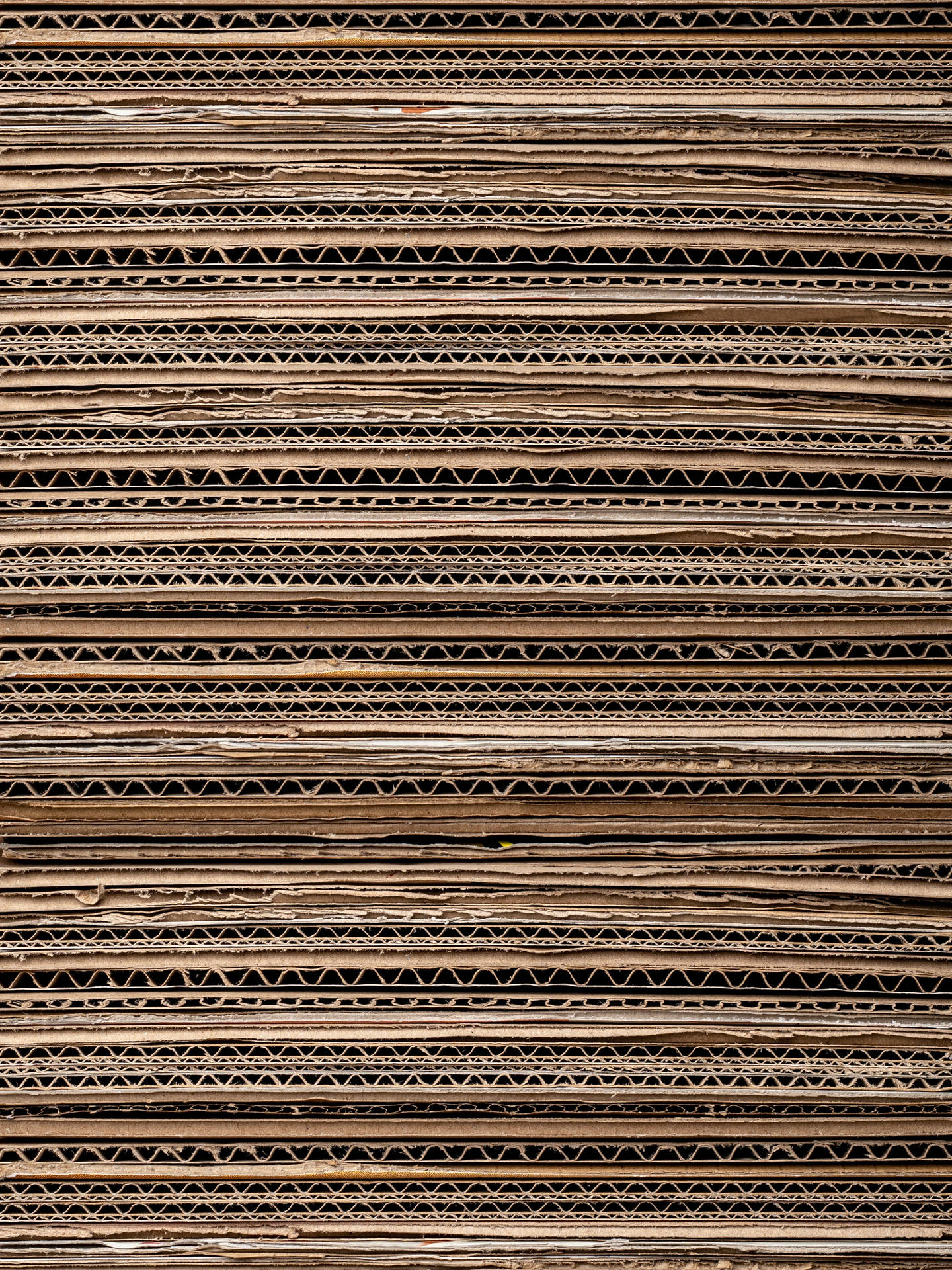 Close-up Of Brown Textured Cardboard Boxes Wallpaper