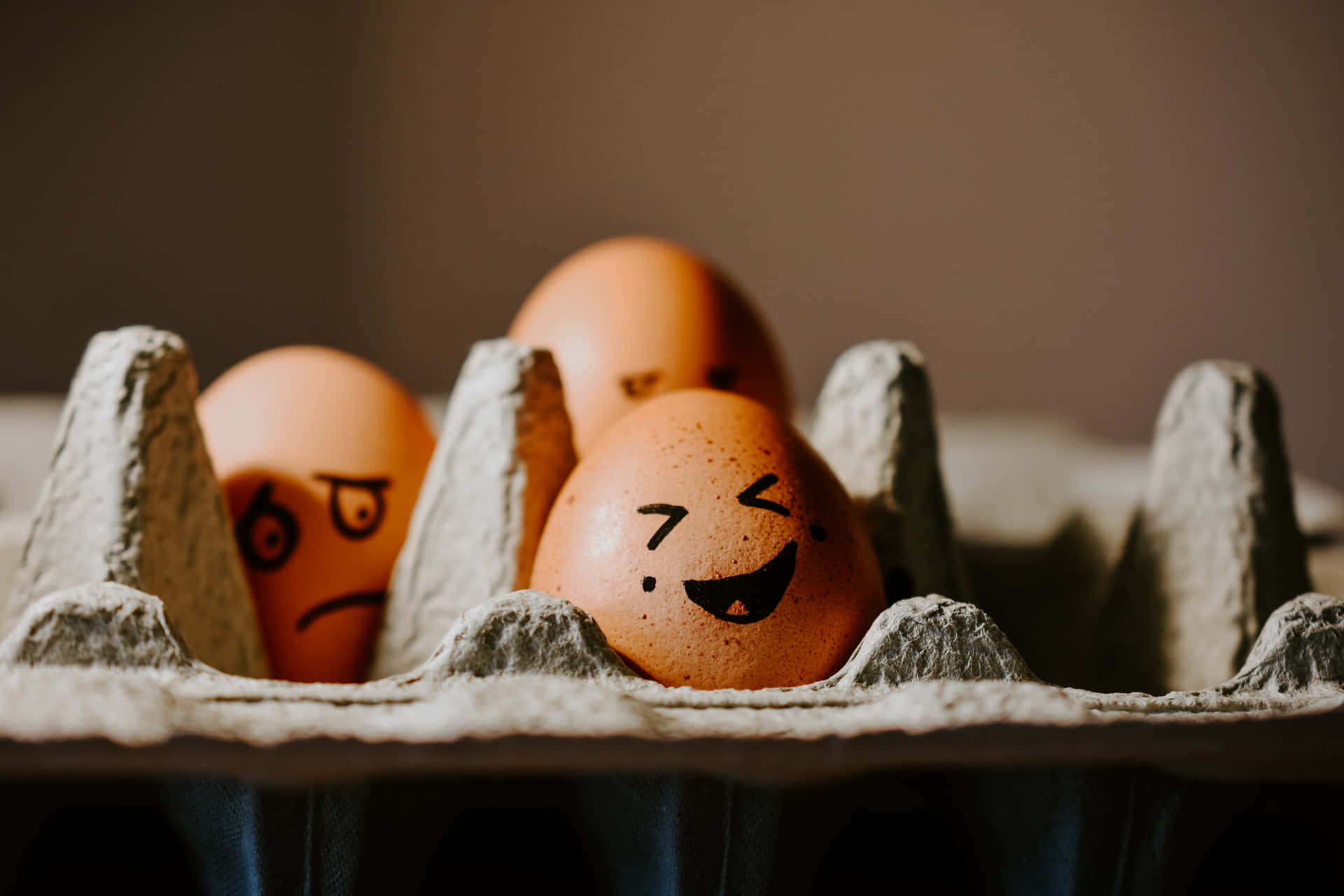 A basket filled with natural brown eggs Wallpaper