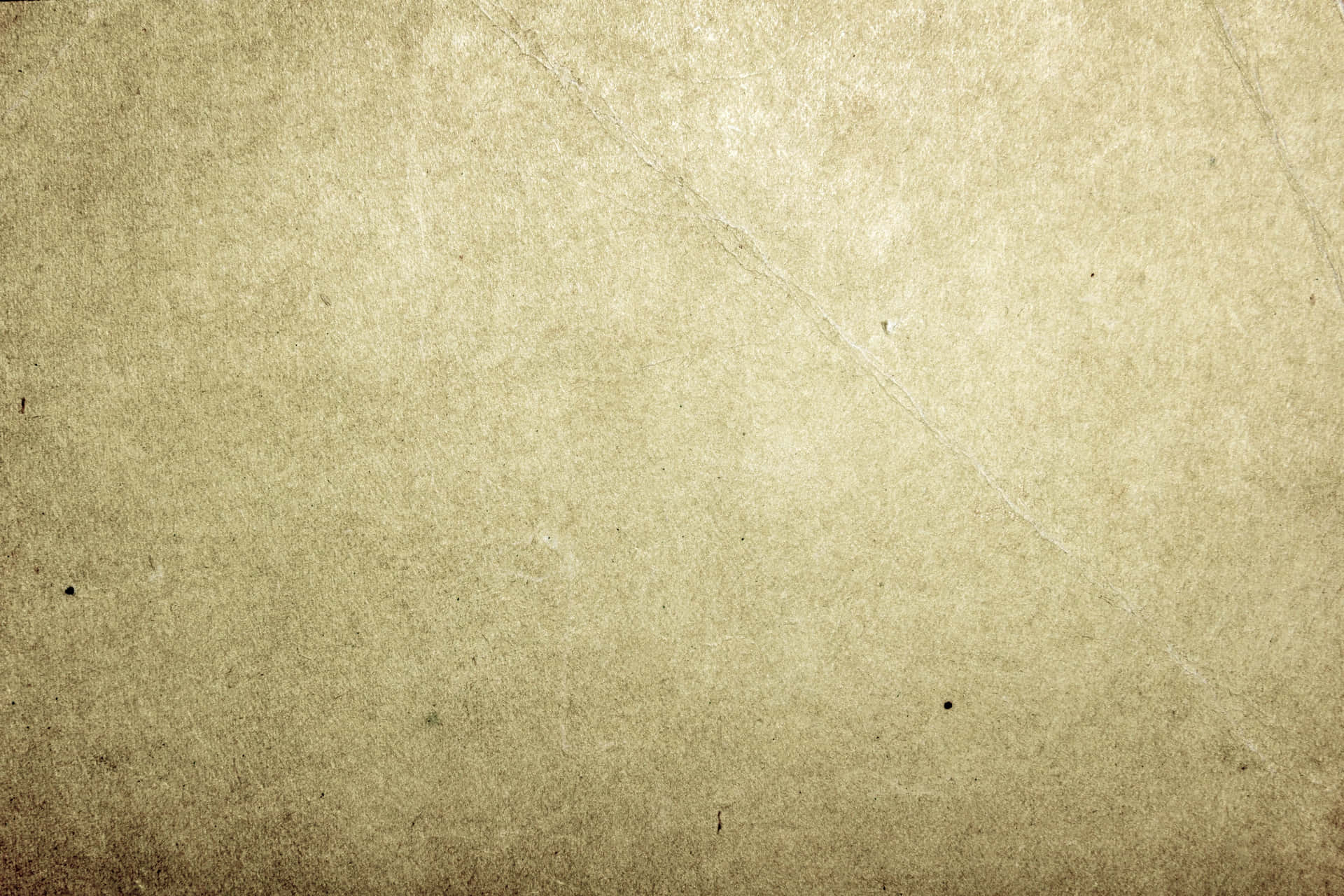 A textured brown paper background Wallpaper