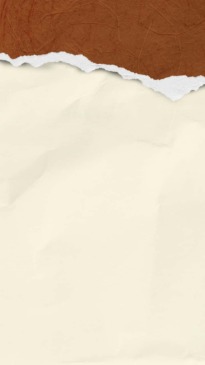 Brown Torn Paper On White Background Wallpaper