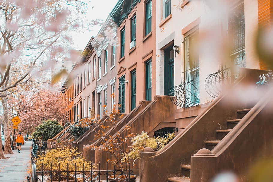 Beautiful Brownstone building exterior with classic architecture Wallpaper