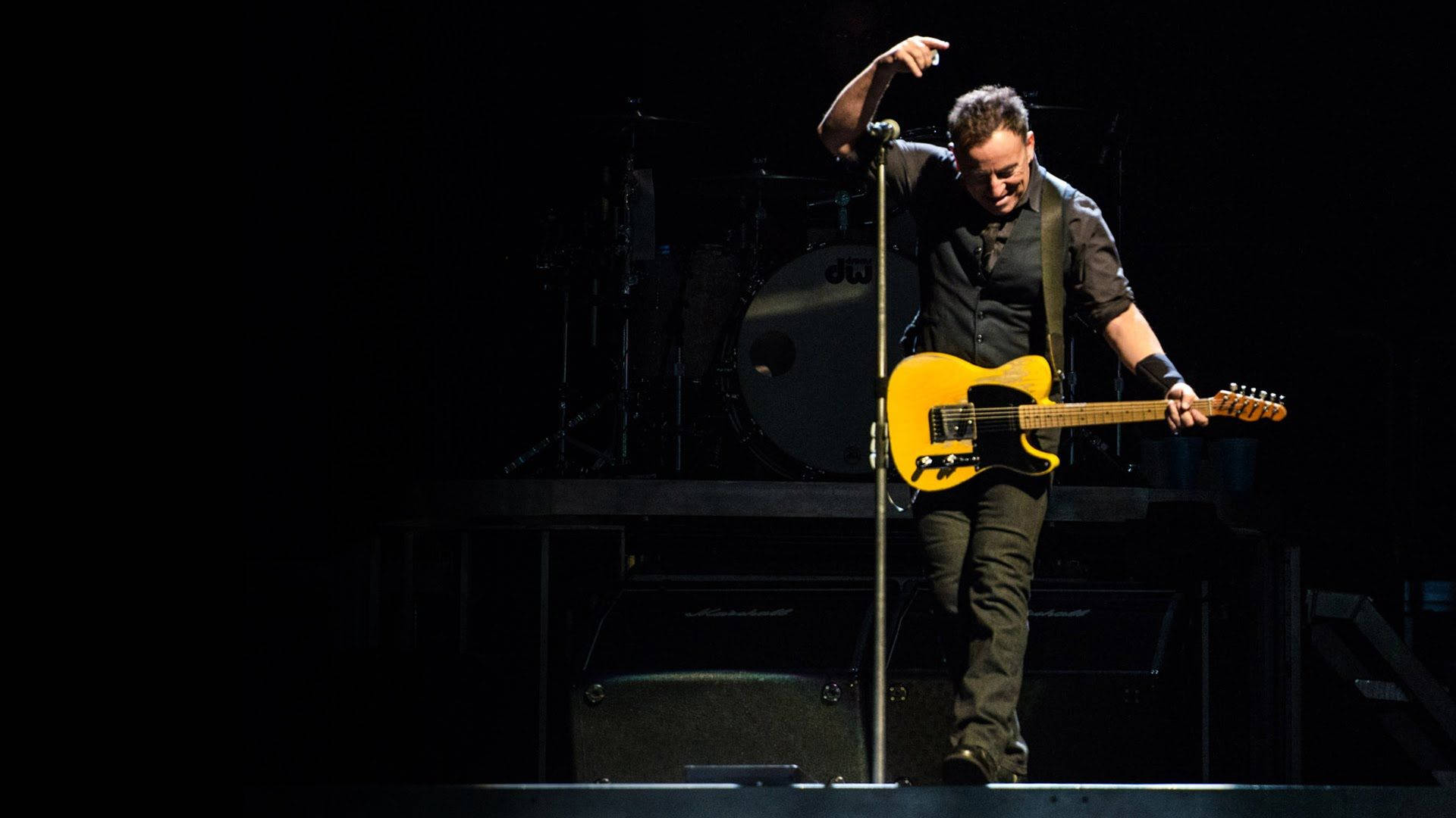 Caption: Rock icon Bruce Springsteen performing at the Light of Day 2015 concert. Wallpaper
