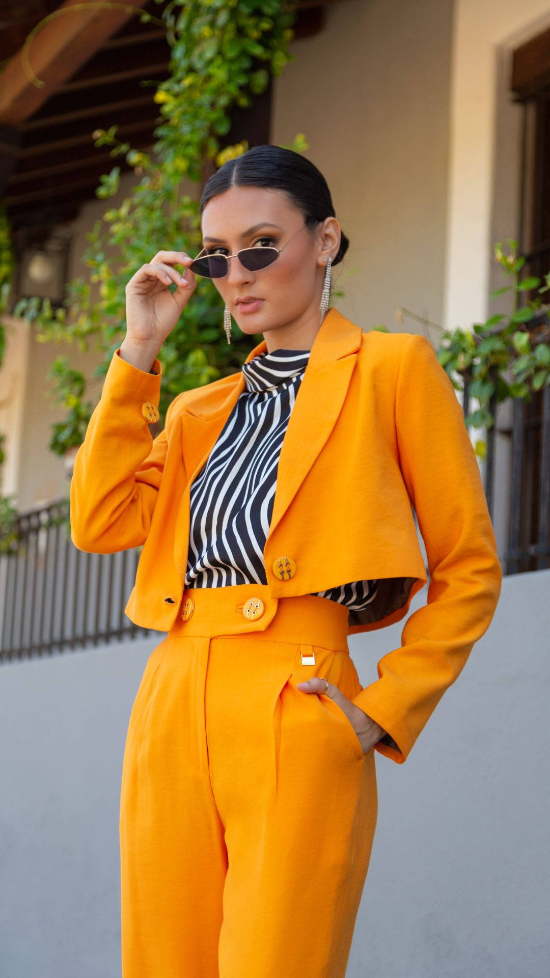 Brunette Woman Orange Suit Wallpaper