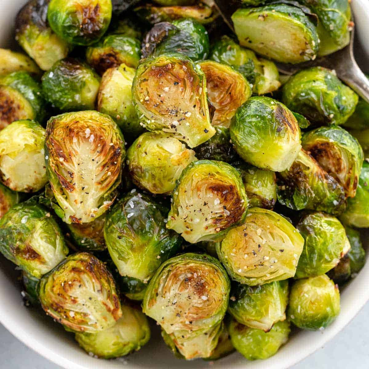 A close up of delicious crispy brussel sprouts.