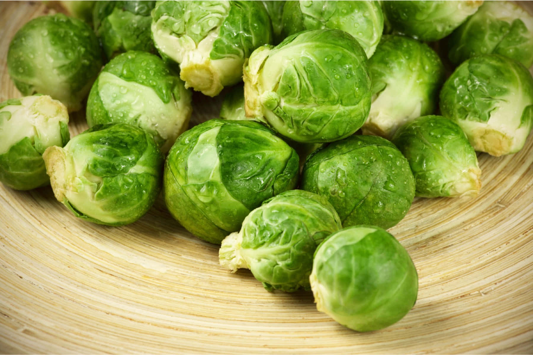 Brussel Sprouts On A Wooden Plate