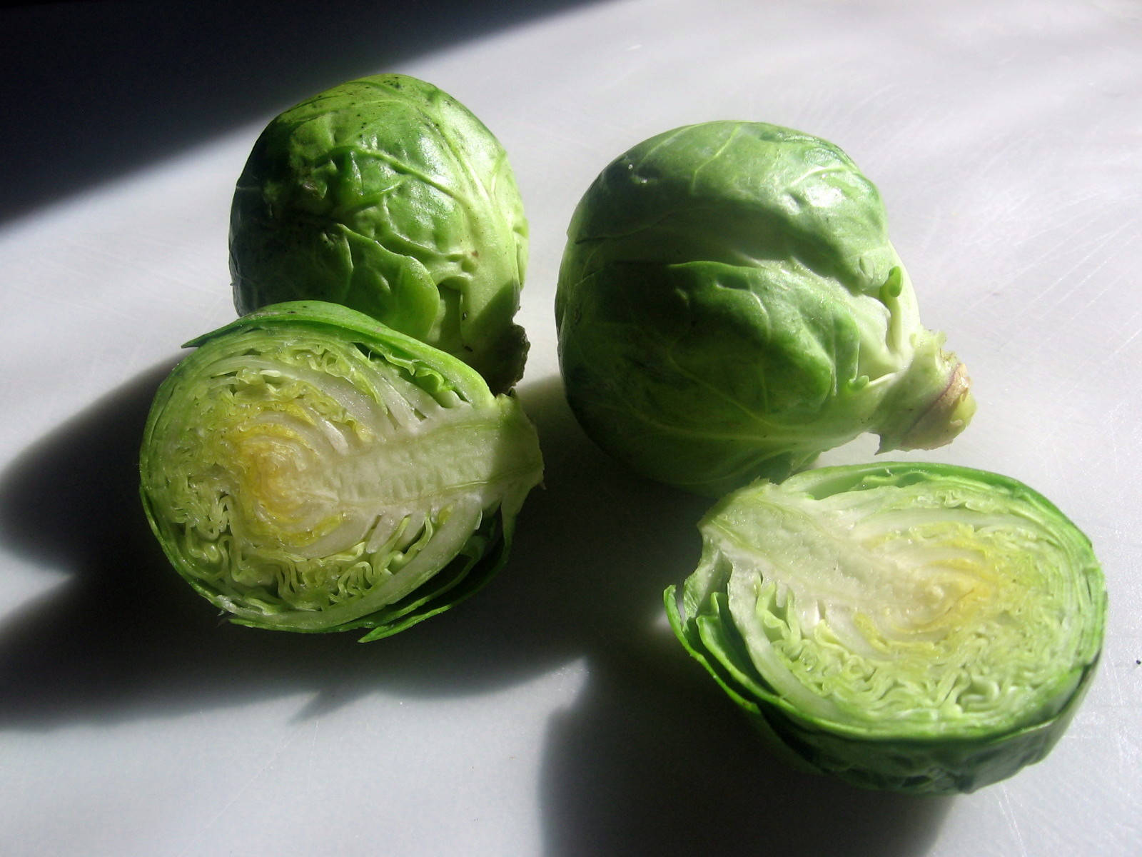 Brussels Sprouts Atop A Marble Platform Wallpaper