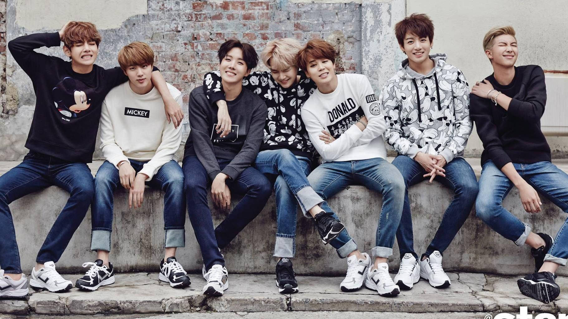 BTS 2020 Seated On Concrete Bench Wallpaper