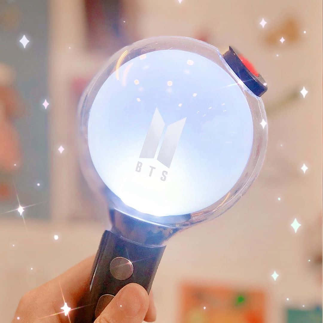 Caption: Light up your world with BTS Army Bomb Wallpaper