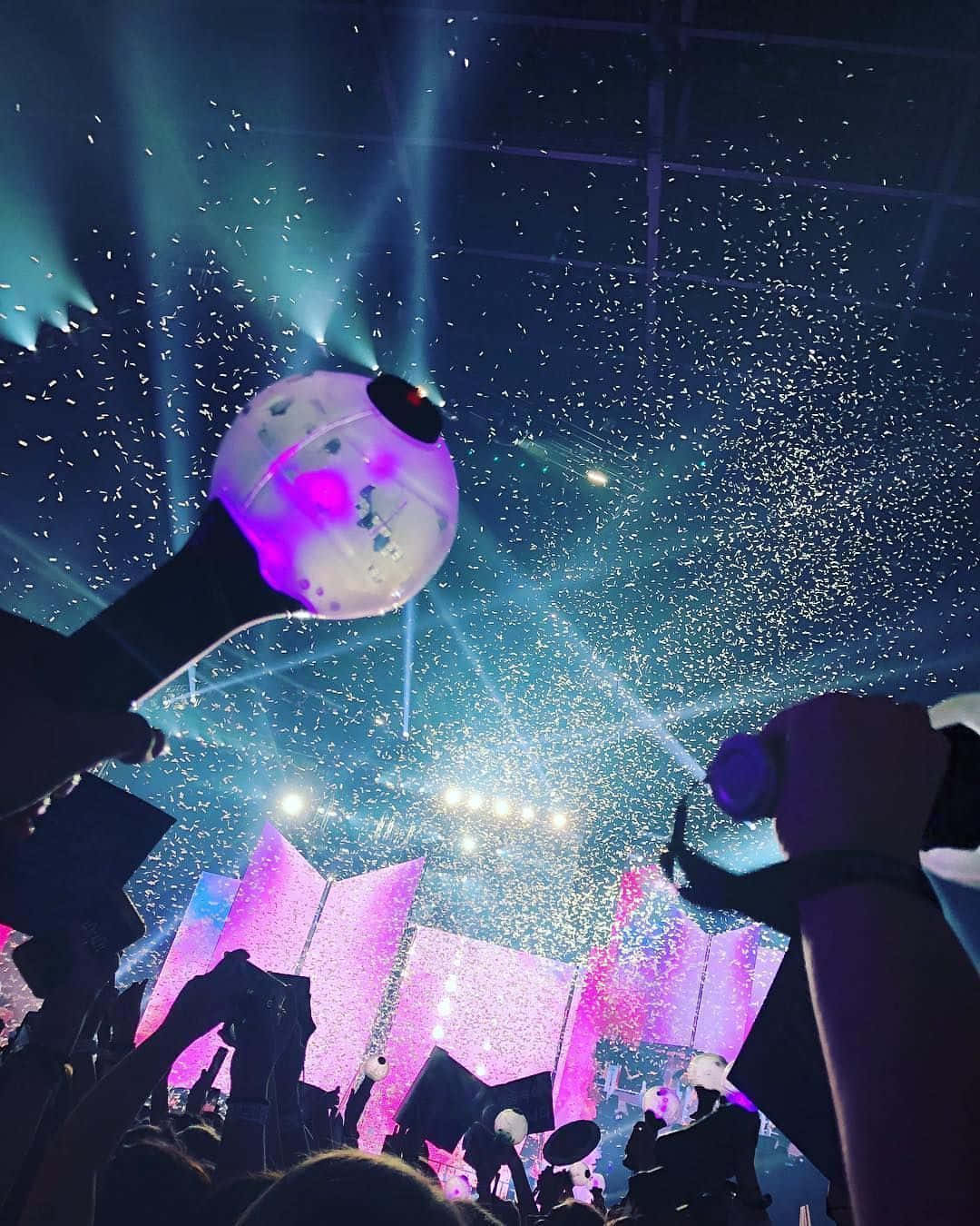 BTS Army Bomb waving in the air Wallpaper