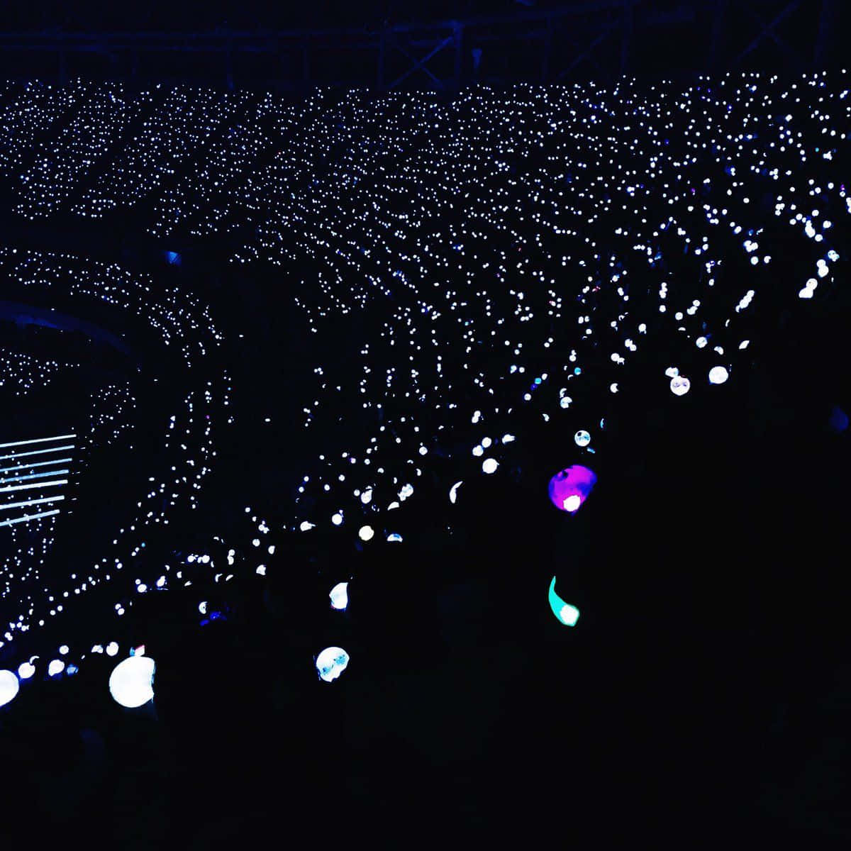 BTS Army Bomb glowing in the dark Wallpaper