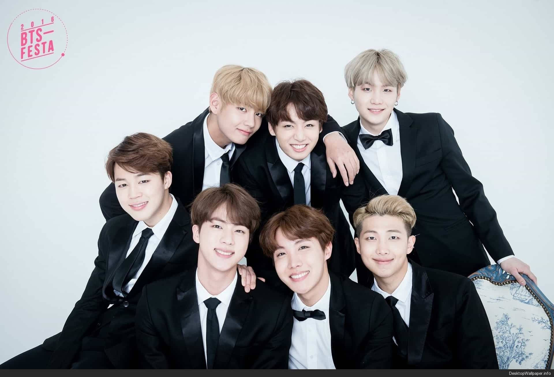 Download BTS in Black Suits, Making an Impression Wallpaper