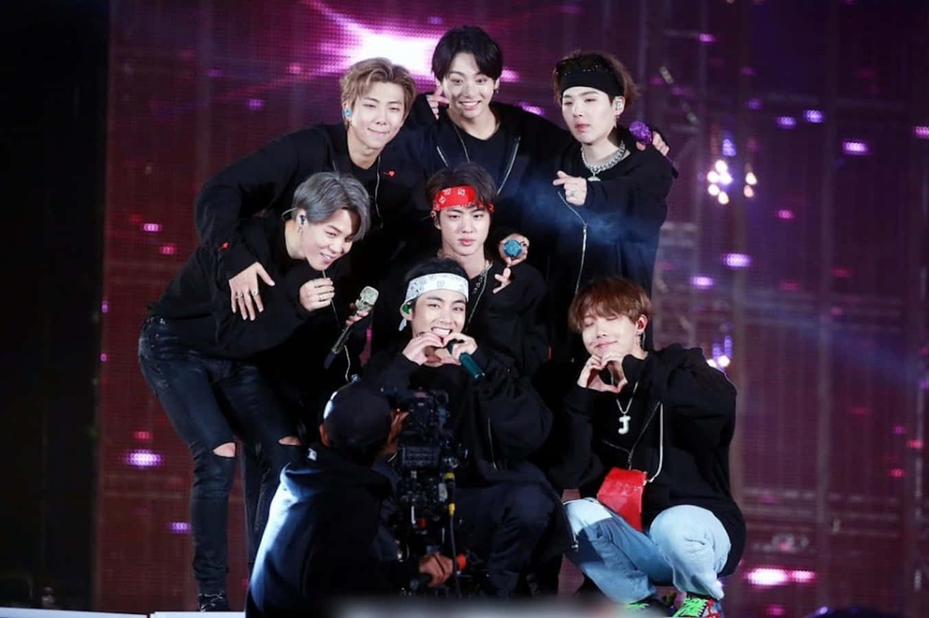 Fans of the K-Pop group BTS come together for a rowdy and passionate concert.