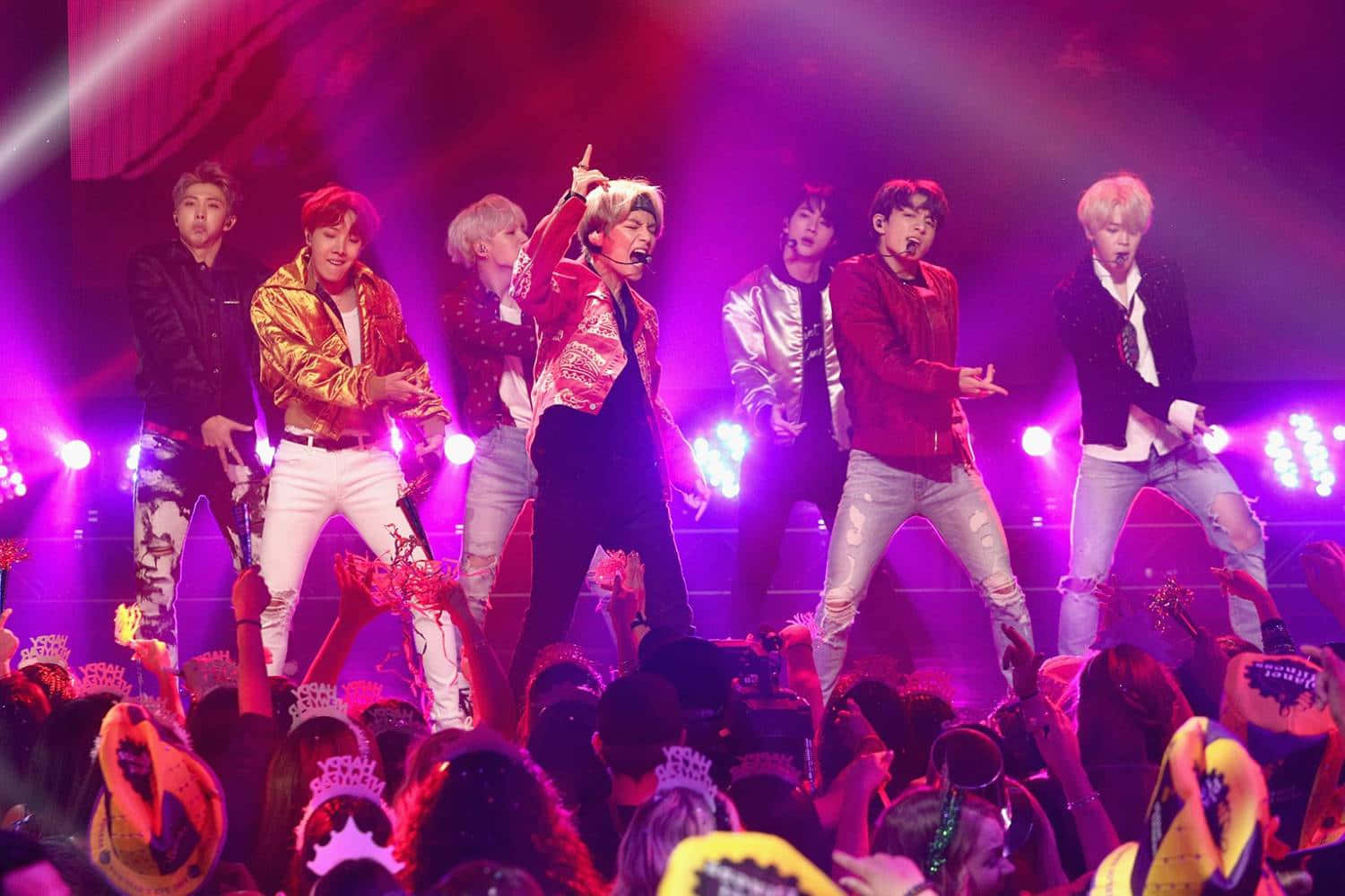 BTS putting on an incredible show at a sold-out concert.