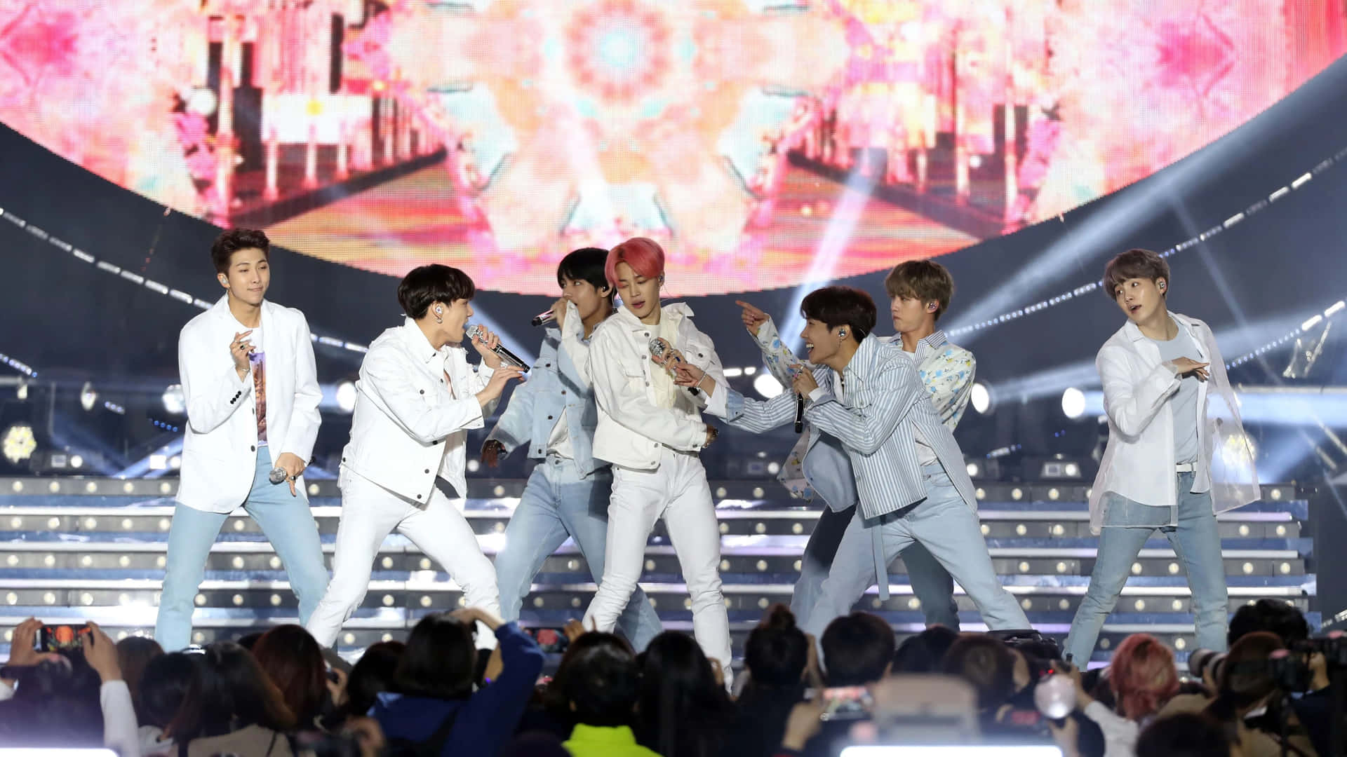BTS electrifies their fans with an incredible concert performance.