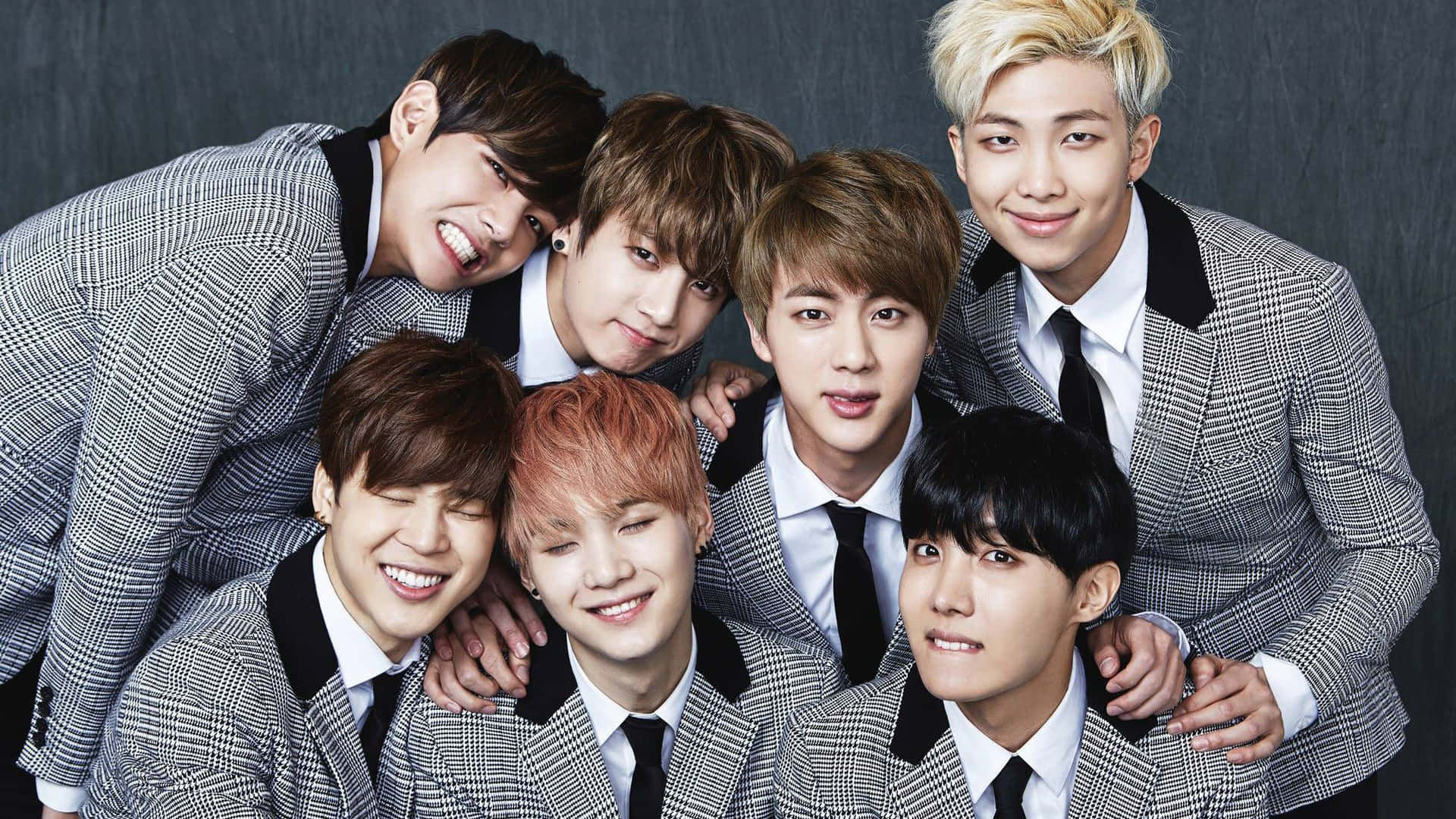 Bts - A Group Of Young Men Posing For A Picture
