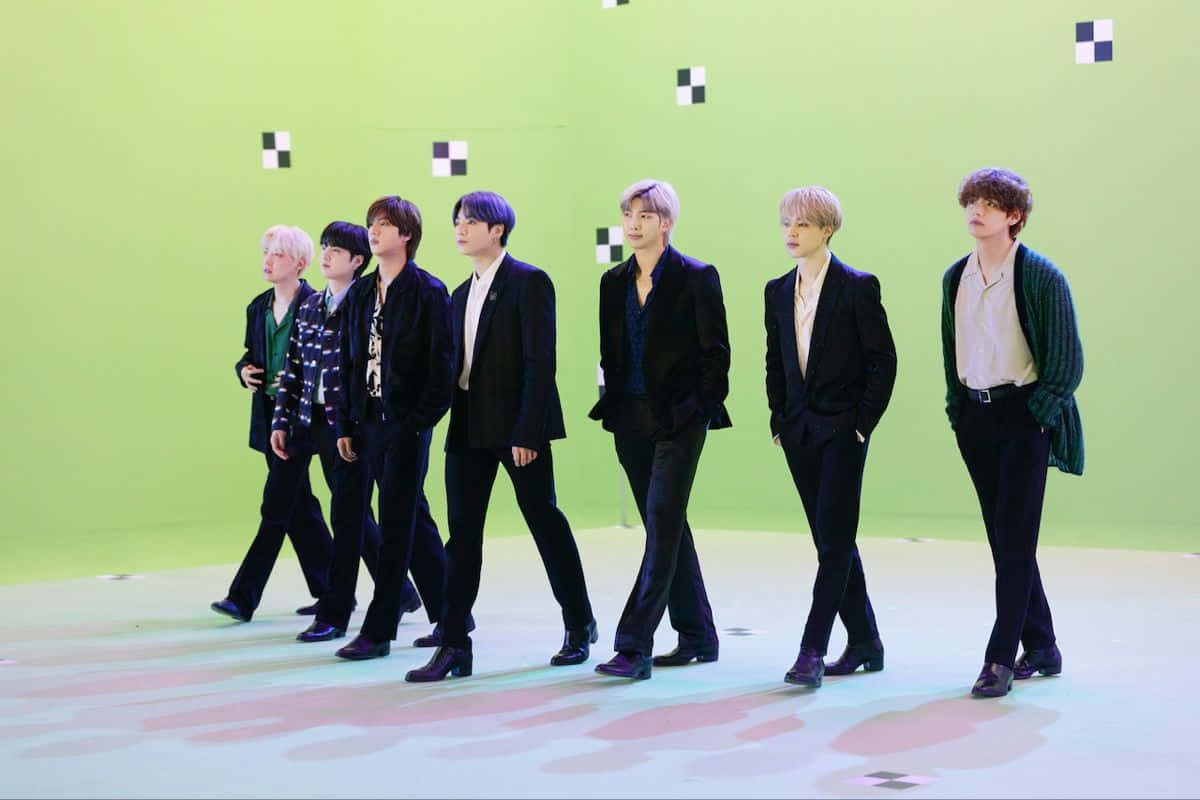 BTS posing together during a brand endorsement shoot Wallpaper