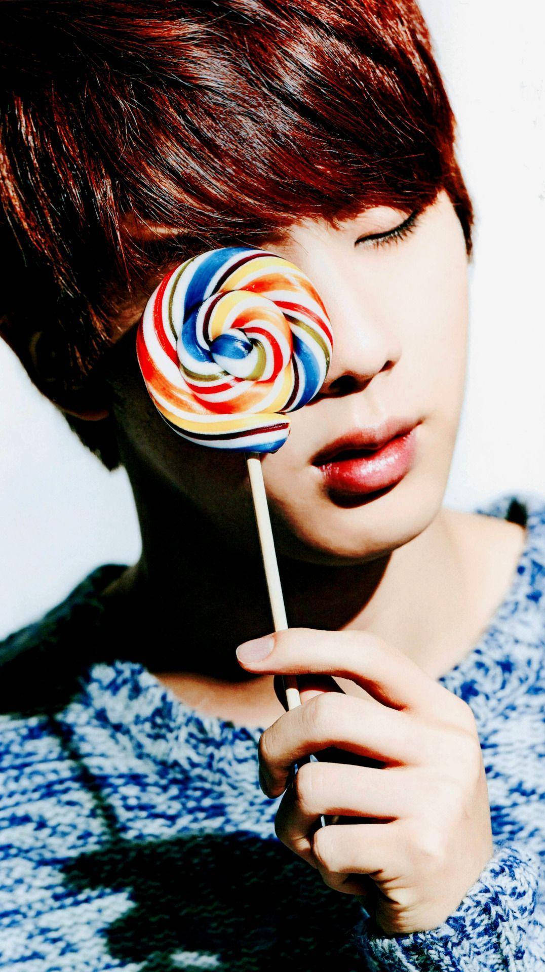BTS Jin With Twirl Lollipop Wallpaper