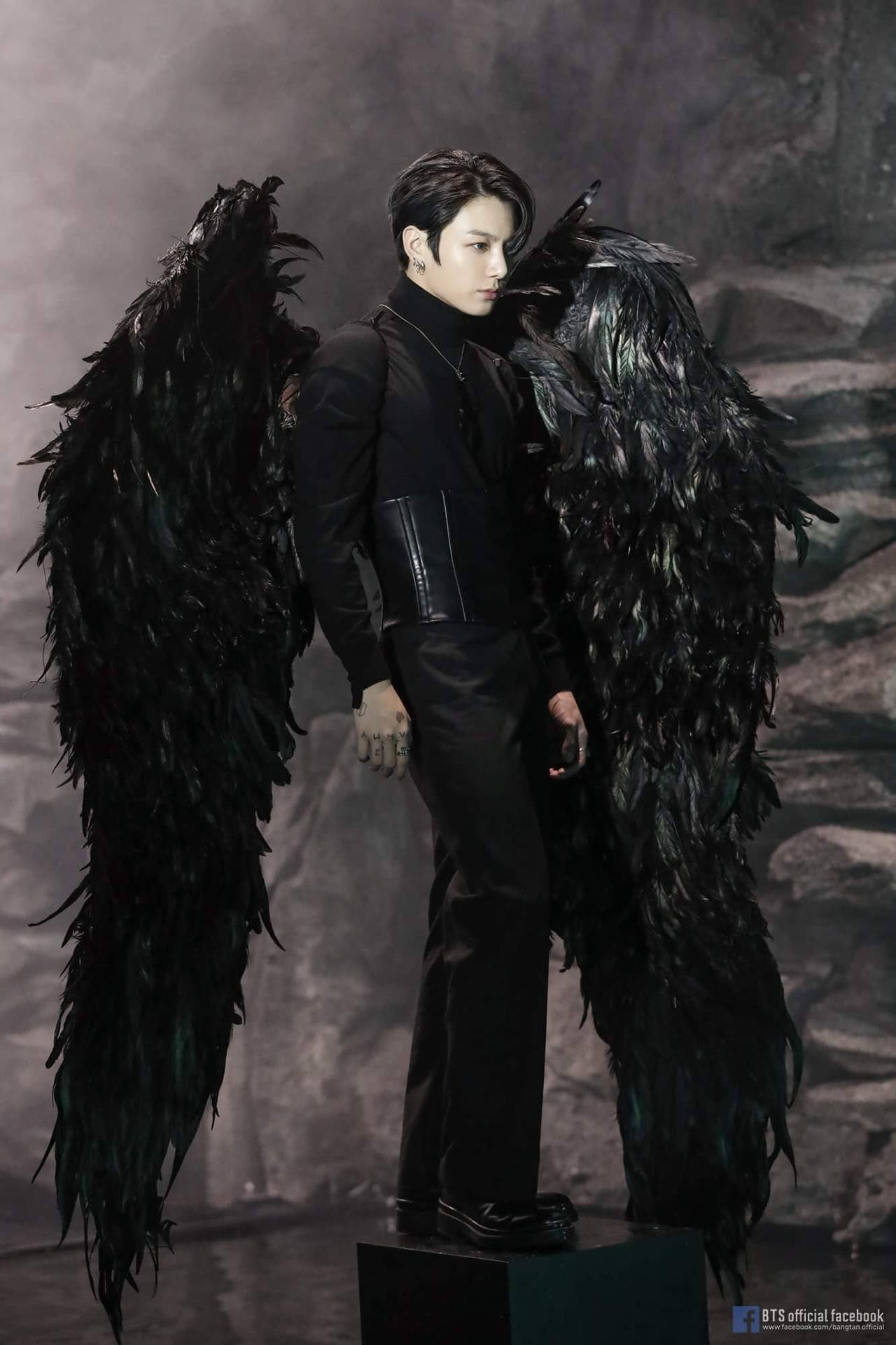 Download Bts Jung Kook Cute Black Wings Wallpaper | Wallpapers.com