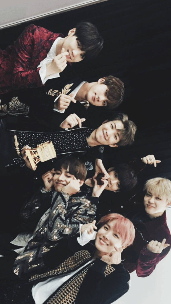 Members of the K-pop band BTS unite for a friendship picture. Wallpaper