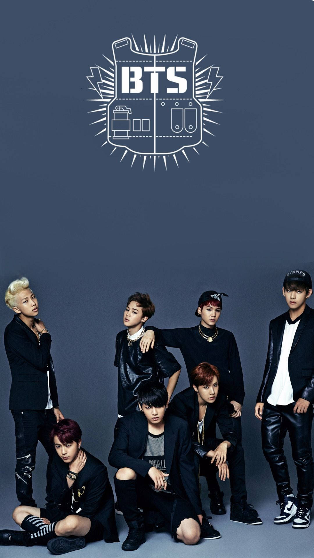 BTS boyband members V, Jungkook, Jimin, Suga, Jin, Rm and J-hope in black casual clothes.