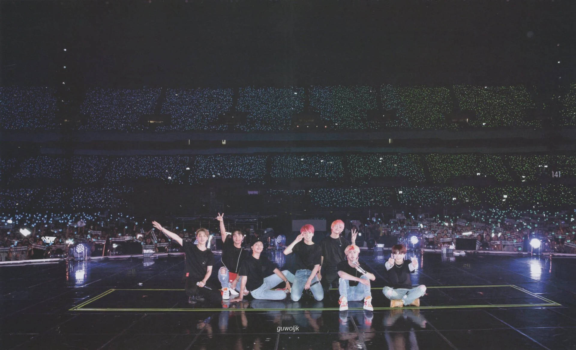 BTS Posing With Armies In A BTS Concert Wallpaper