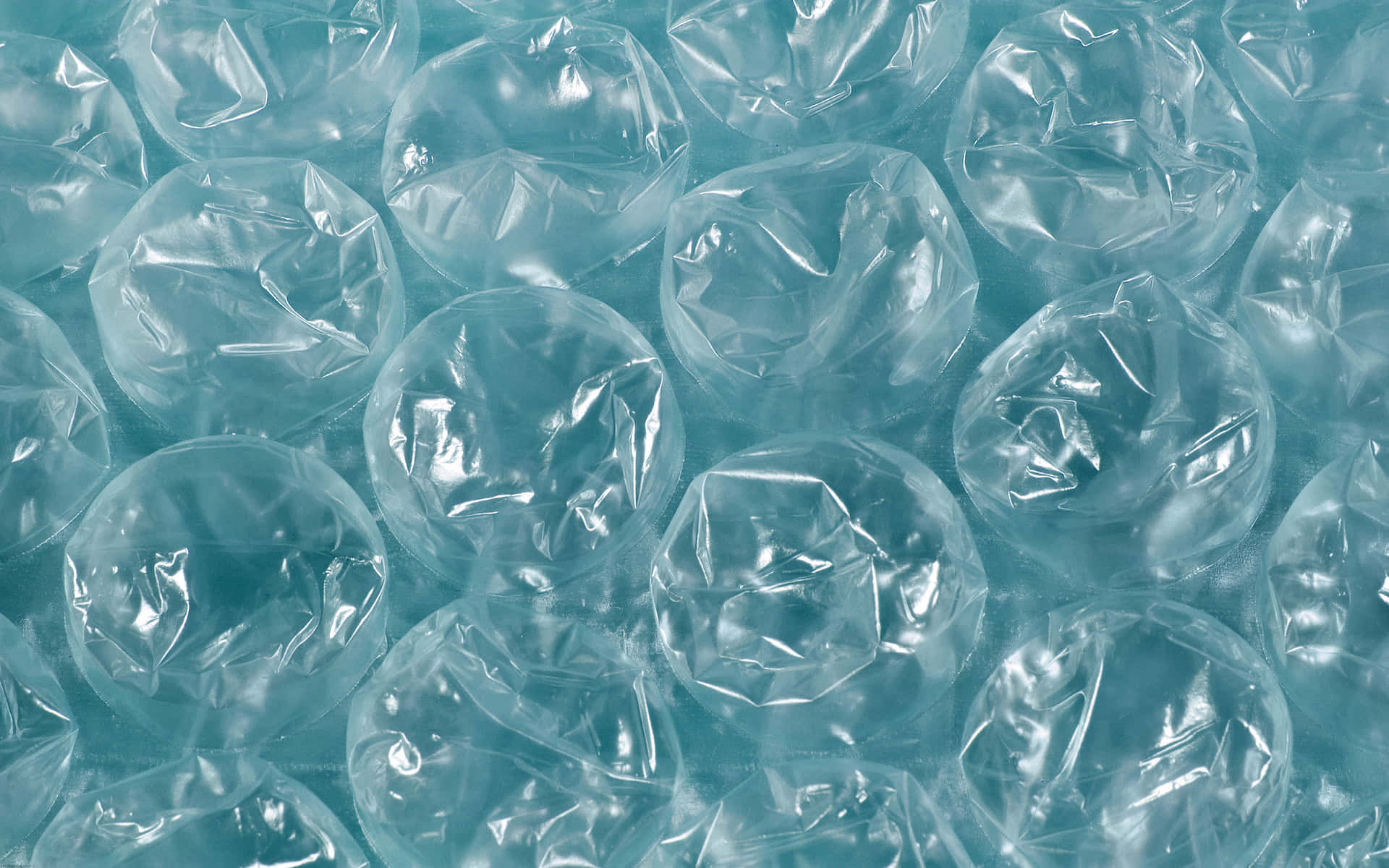Fondode Burbujas De Plástico Con Superficie Azul Claro.