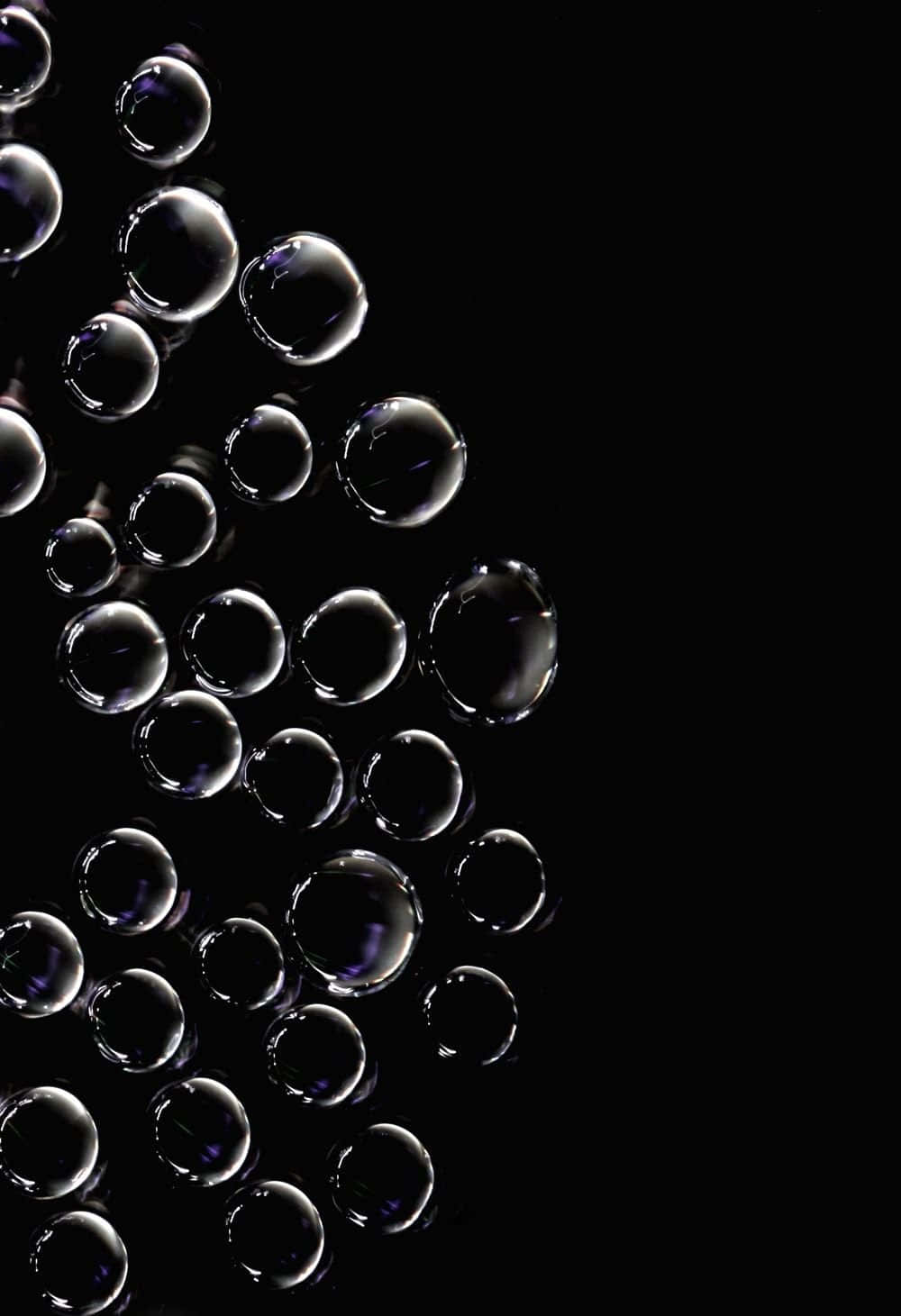 Fondode Burbujas - Burbujas Flotantes En Una Superficie Oscura.