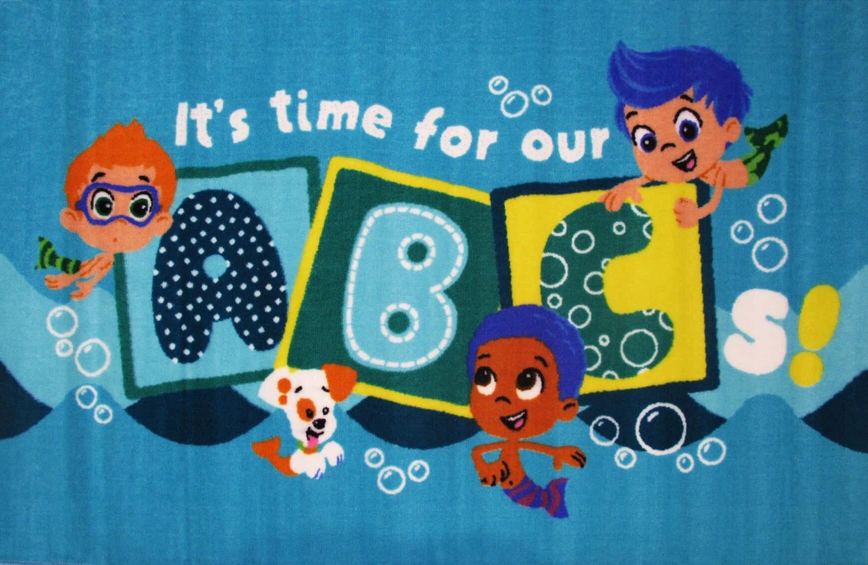 A Blue Rug With The Words'it's Time For Our Abcs'