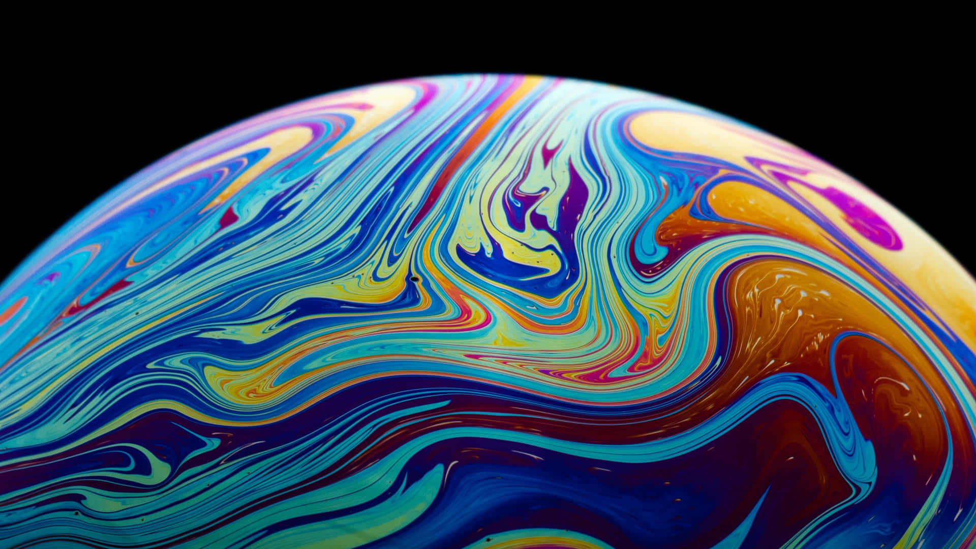 An Apple Iphone X With Colorful Swirls On It