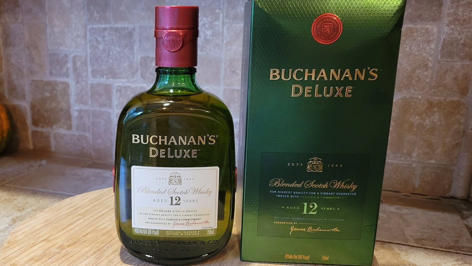 Buchanan's Deluxe Whiskey With Packaging Wallpaper
