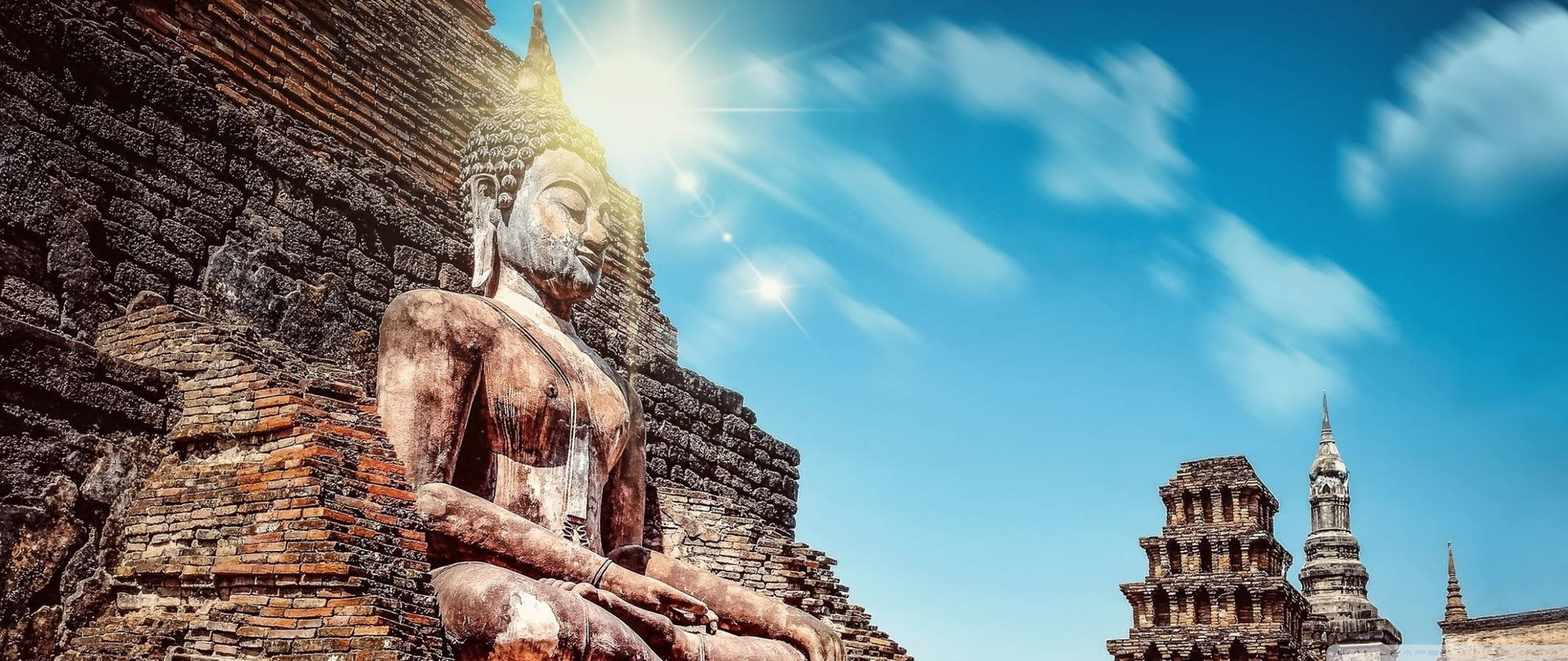 Buddha Statue Under Sun Wallpaper