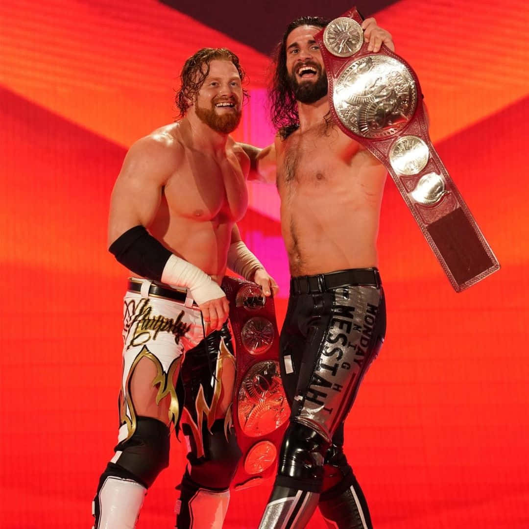 Buddy Murphy And Seth Rollins Raw Tag Team Champions Wallpaper
